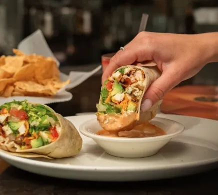 Mi Cocina's Rico Wrap 100% Giveback Event